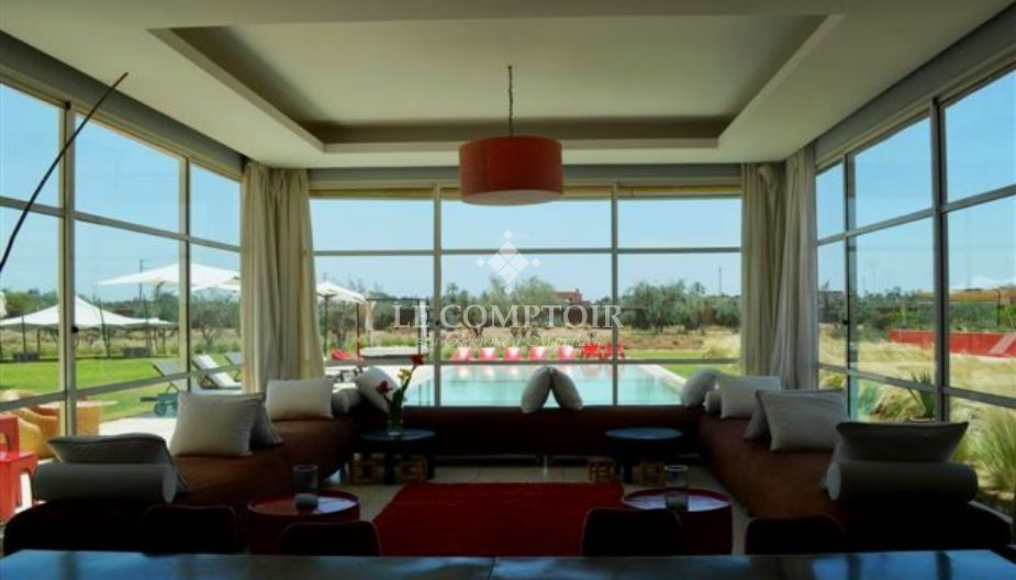 Le Comptoir Immobilier Agence Immobiliere Marrakech Magnifique Demeure Contemporaine Bab Atlas Marrakech Villa LOANAELLE Salon Vue Piscine